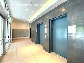 Modern 2 Bed, 2 Bath Condo in the Heart of in Squamish, BC - Building Photo - Building Photo