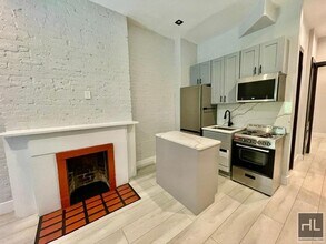 European-Style 1 Bedroom with Private Gard in New York, NY - Building Photo - Building Photo