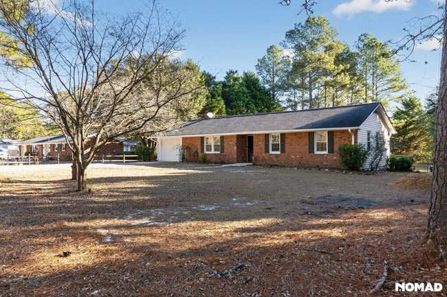 215 N Pine St in Pinebluff, NC - Foto de edificio - Building Photo