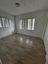 9703 NW 70th Ct in Tamarac, FL - Building Photo - Building Photo