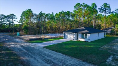 1245 W Hedgewood Ln in Citrus Springs, FL - Foto de edificio - Building Photo