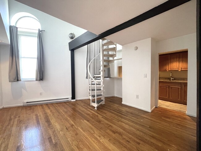 property at 124 Winnisiment St