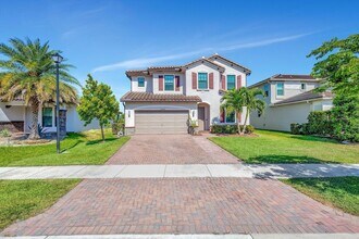 3244 Dunning Dr in Royal Palm Beach, FL - Building Photo - Building Photo
