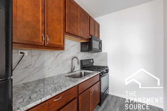 2700 N Milwaukee Ave, Unit 215 in Chicago, IL - Building Photo - Building Photo