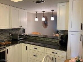 5530 Rattlesnake Hammock Rd in Naples, FL - Building Photo - Building Photo
