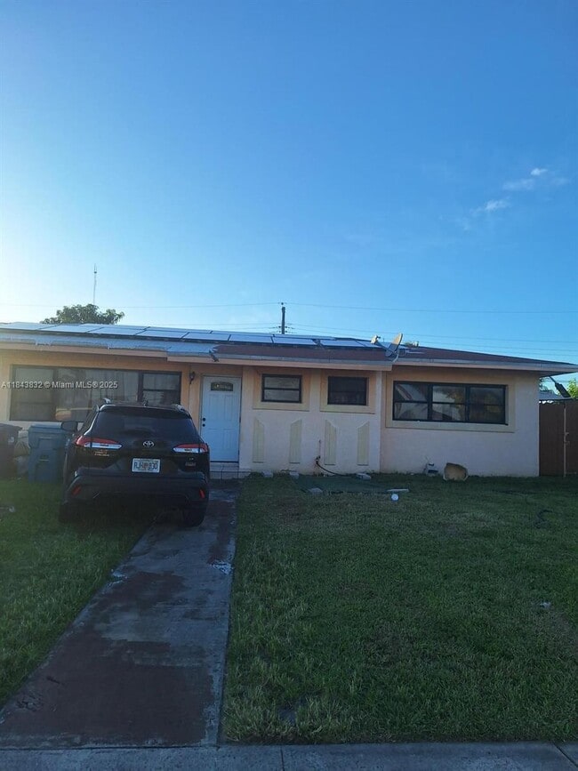 property at 115 NW 193rd St
