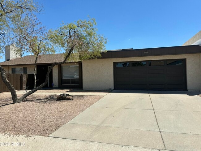 property at 8691 E Latham St