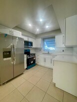 1480 E Sample Rd in Pompano Beach, FL - Building Photo