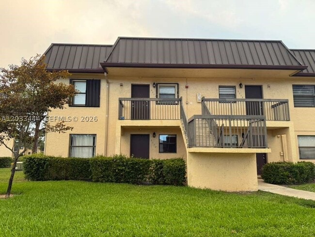 property at 9220 NW 1st St