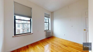 214 E 10th St in New York, NY - Building Photo - Building Photo