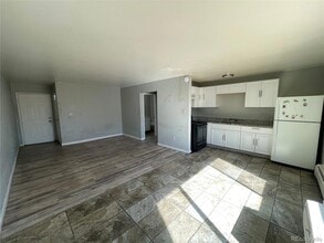 1590 Clinton St, Unit 106 in Aurora, CO - Foto de edificio - Building Photo