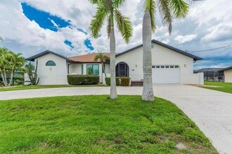 105 Sinclair St SE in Port Charlotte, FL - Building Photo - Building Photo