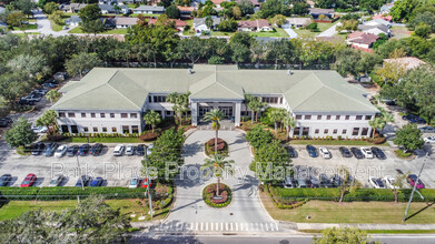 6000 Turkey Lake Rd in Orlando, FL - Building Photo - Building Photo