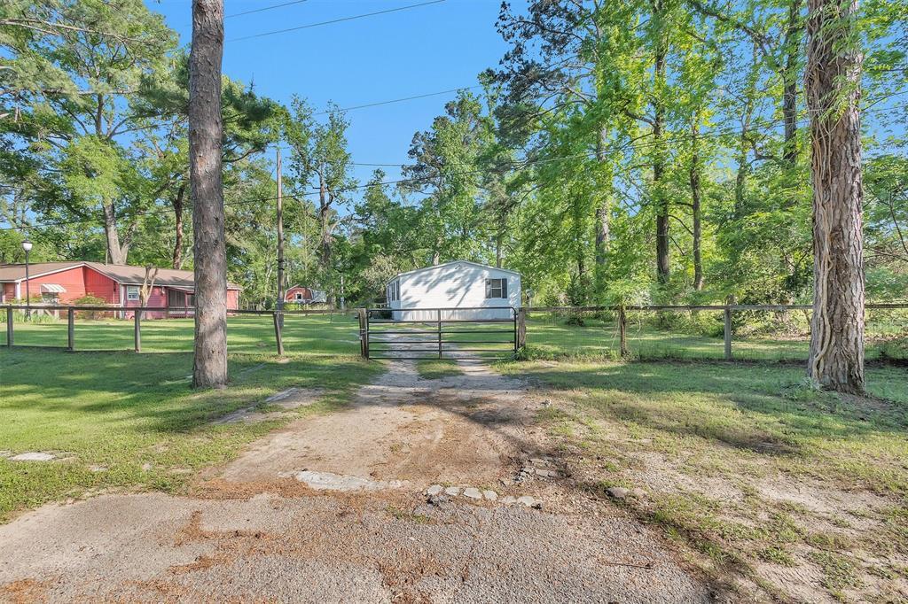 13890 Old Texaco Camp Rd in Conroe, TX - Building Photo