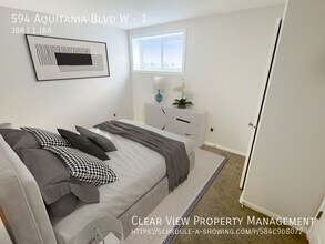 594 Aquitania Blvd W in Lethbridge, AB - Building Photo - Building Photo