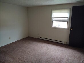 212 Patricia Dr, Unit E in Byesville, OH - Building Photo - Building Photo