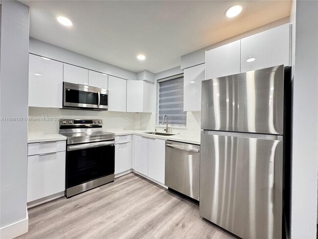 property at 6175 NW 186th St