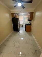6217 N Mozart St, Unit 2E in Chicago, IL - Foto de edificio - Building Photo