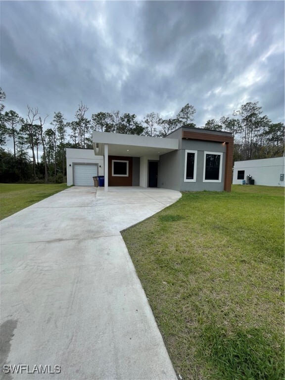 141 Greenbriar Blvd in Lehigh Acres, FL - Building Photo - Building Photo