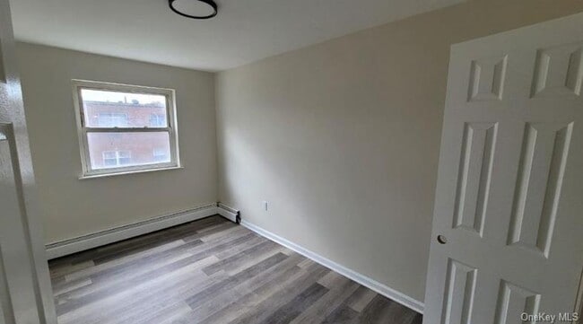 property at 762 E 211th St