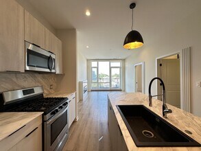 6340 W Belmont Ave, Unit A03W in Chicago, IL - Building Photo - Building Photo