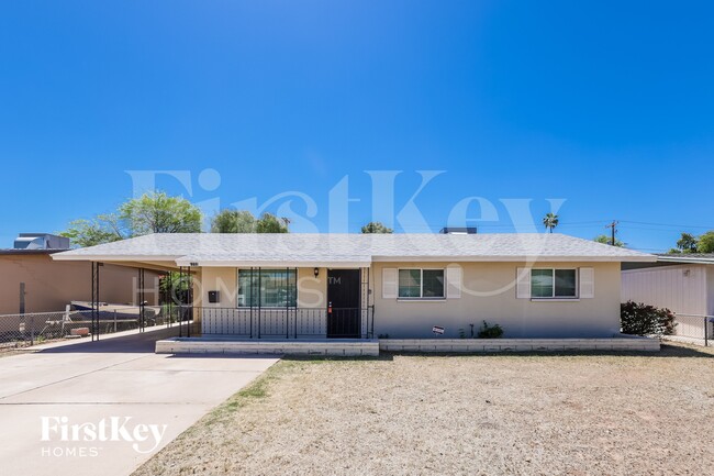 property at 1233 W 16th St