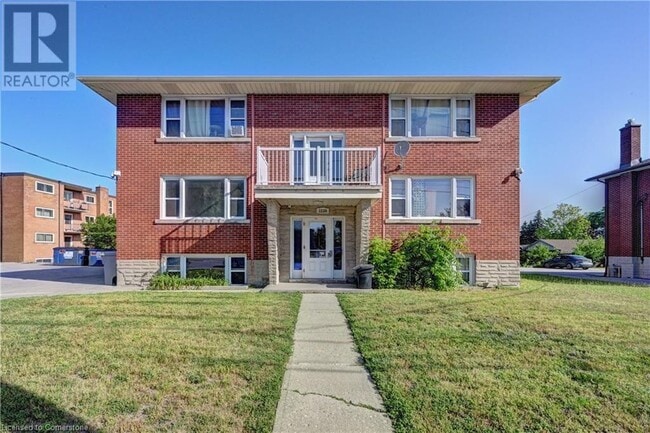 property at 1230 Queen's Blvd