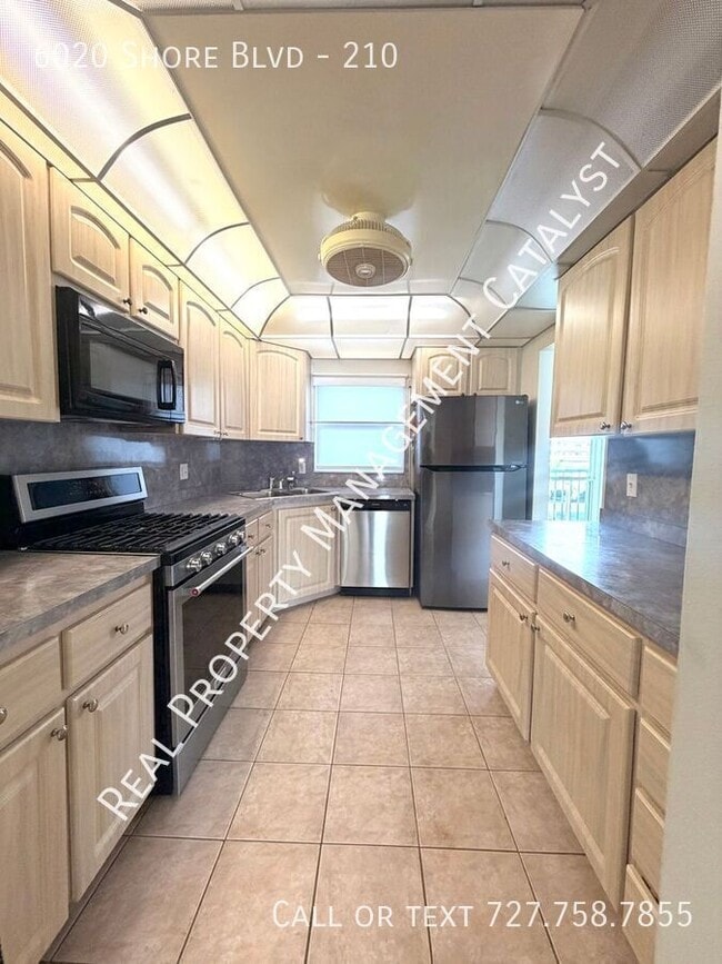 property at 6020 Shore Blvd S