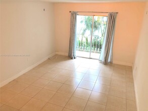 4301 NW South Tamiami Canal Dr, Unit 3-209 in Miami, FL - Building Photo - Building Photo