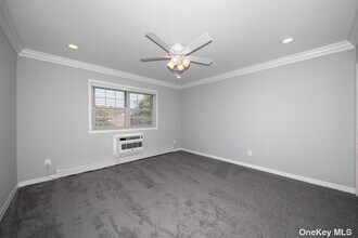 120 Sussex Pl, Unit PA23 in Bohemia, NY - Building Photo - Building Photo