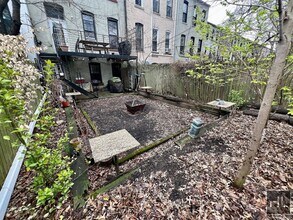 2BR 1BA Garden Level Brownstone w/ Free La in Brooklyn, NY - Building Photo - Building Photo