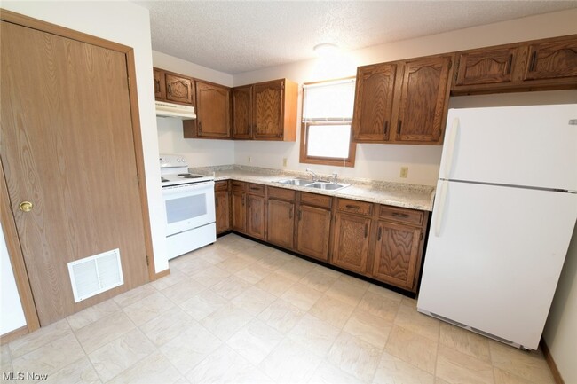 1328 Richey Rd-Unit -B in Zanesville, OH - Foto de edificio - Building Photo