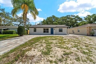 10707 N Rome Ave in Tampa, FL - Foto de edificio - Building Photo