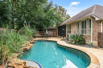 47 Dresden Pl in Spring, TX - Foto de edificio - Building Photo