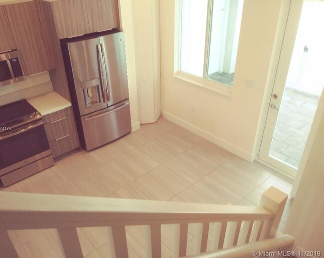 10260 NW 63rd Ter, Unit 102 in Doral, FL - Foto de edificio - Building Photo