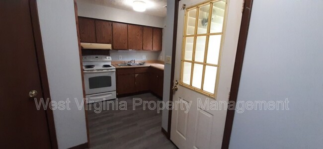 82 Beagle Club Rd in Jumping Branch, WV - Building Photo - Building Photo