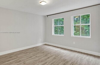 1 Alhambra Cir, Unit 203 in Coral Gables, FL - Building Photo - Building Photo