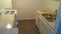 Grey Plank Tiles - Hollywood Pointe Apartments in Los Angeles, California
