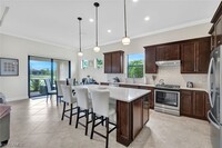 6787 Winding Cypress Dr in Naples, FL - Building Photo - Building Photo