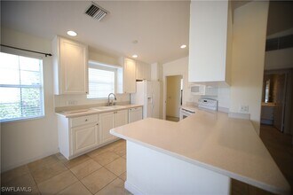 7558 Rozzini Ln in Naples, FL - Building Photo - Building Photo