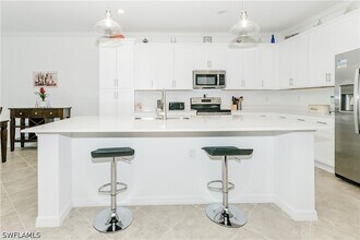 6034 National Blvd, Unit 542 in Ave Maria, FL - Foto de edificio - Building Photo