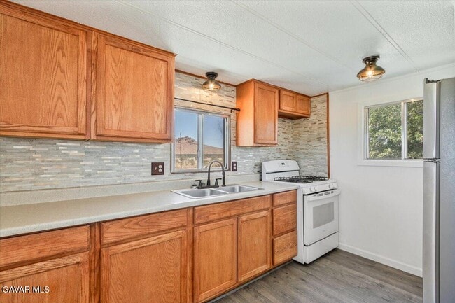 property at 5457 61st St W