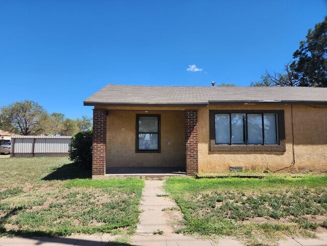 property at 218-220 E 9th St