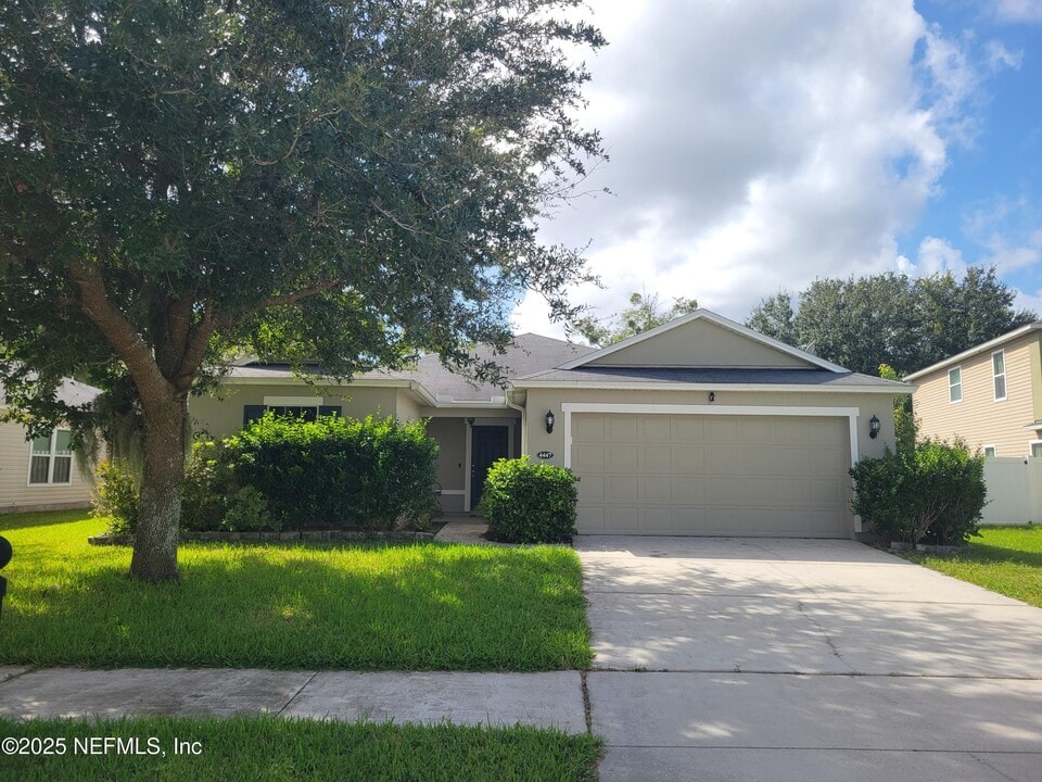 4447 Oak Moss Loop in Middleburg, FL - Building Photo