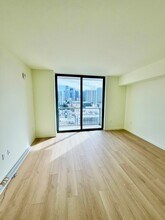 141 NE 2nd St, Unit 900 in Miami, FL - Building Photo - Building Photo