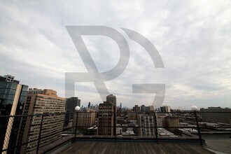 433 W Wellington Ave, Unit W445-04E in Chicago, IL - Building Photo - Building Photo