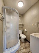 111 W 1st St, Unit 111.5 W 1st St Apt 1 in Lyons, KS - Foto de edificio - Building Photo