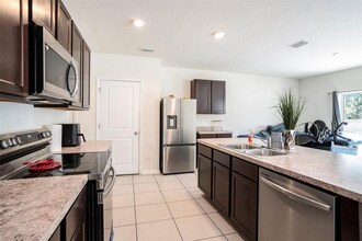 10023 Merry Fawn Ct in Sun City Center, FL - Building Photo - Building Photo