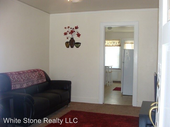 309 9th St in Rawlins, WY - Foto de edificio - Building Photo