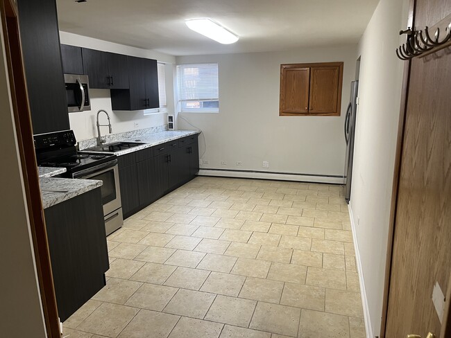 5619 N Luna Ave, Unit Garden in Chicago, IL - Building Photo - Building Photo